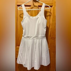 Women’ white Pleated athletic dress with built in shorts and built in bra